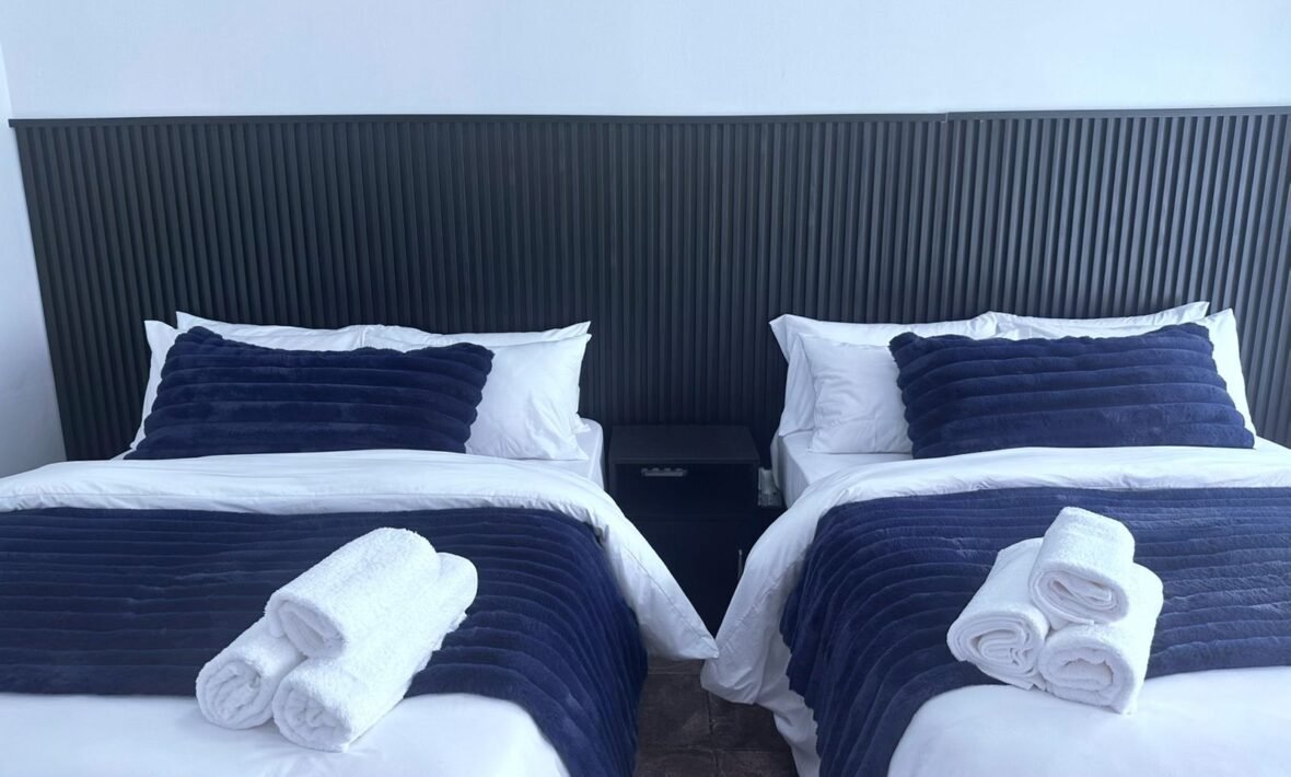 Apartment 1 – Living Room, 2 Double Beds Room & Full Kitchen